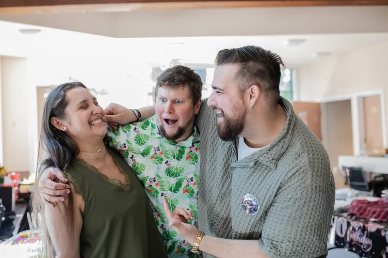 Guests goofing around at a birthday party