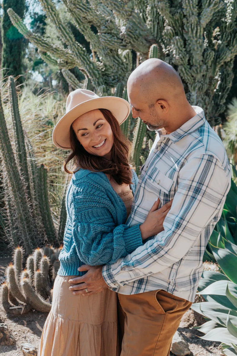 Parents hugging in the desert garden