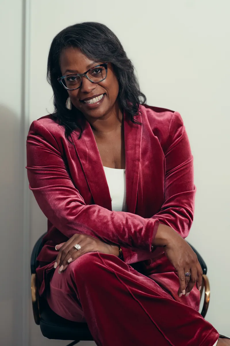 Seated portrait in a velvet suit