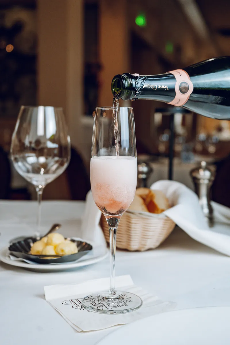 Sparkling rose poured at the table