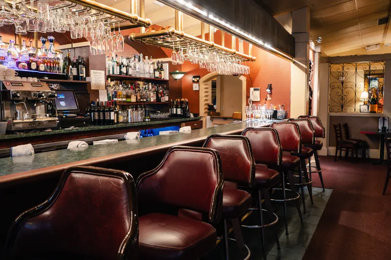 Leather bar stools along the bar